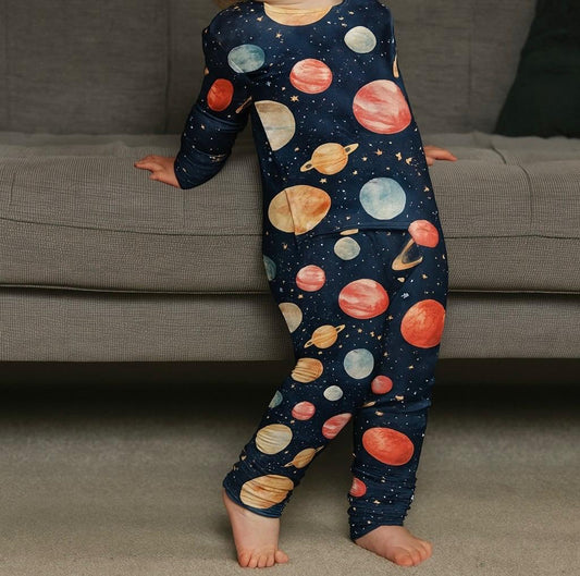 Baby in space sleepsuit